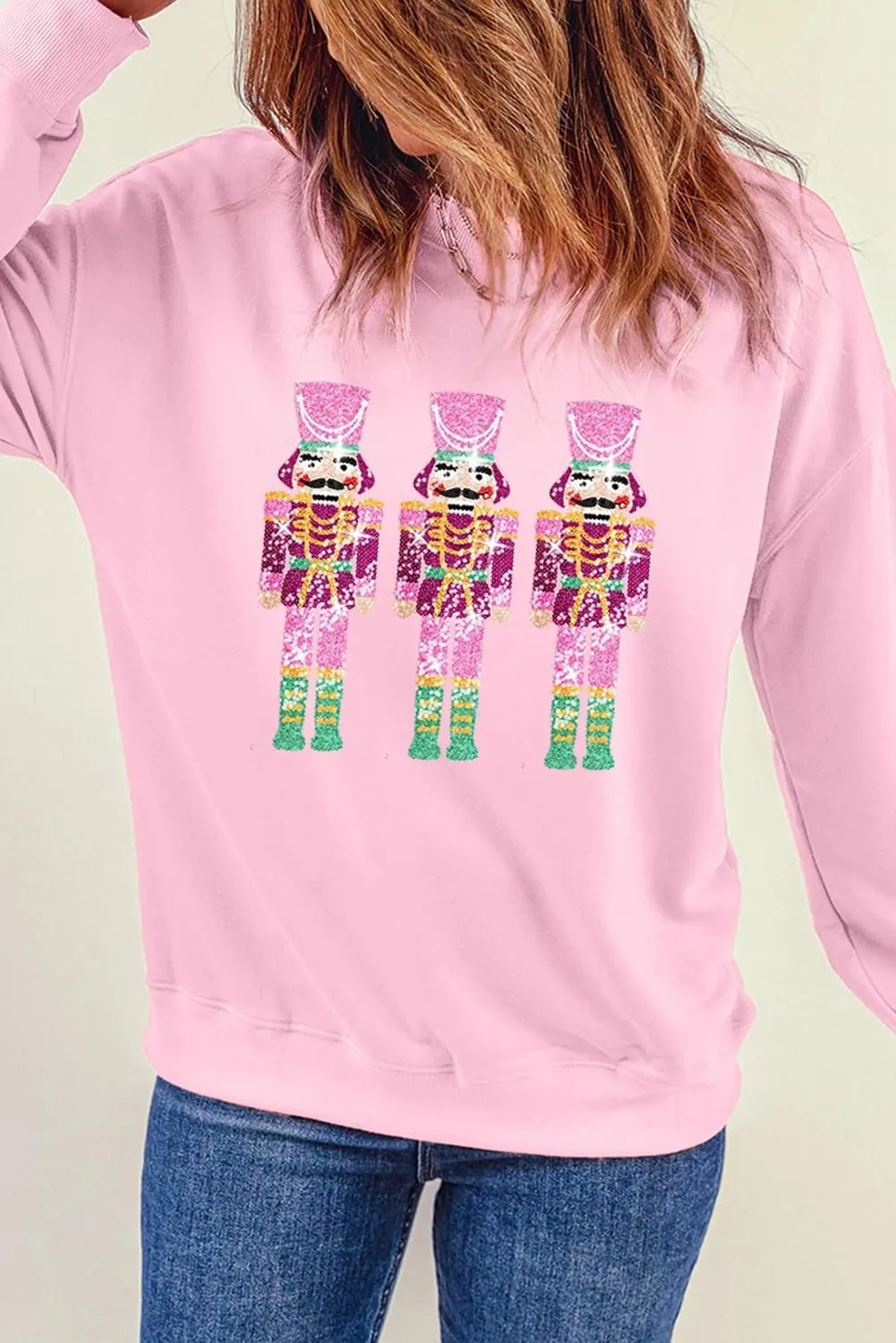 KMBANGI Women Christmas Nutcracker Sweatshirt Holiday Funny Graphic Pullover Top Oversized Crewneck Long Sleeve Shirts