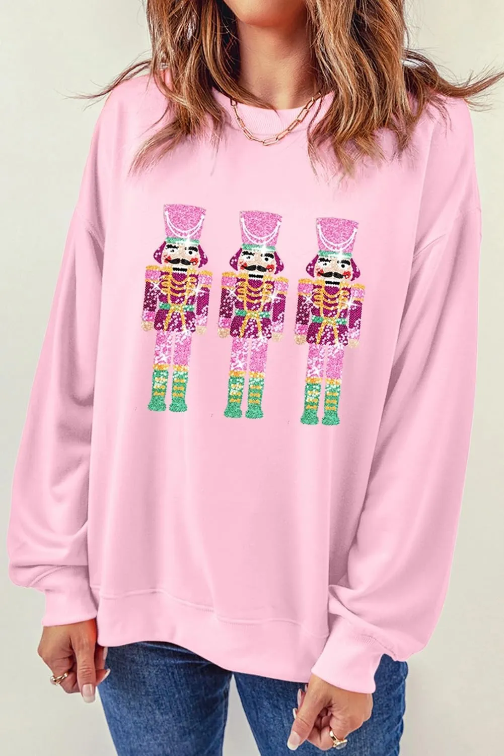 KMBANGI Women Christmas Nutcracker Sweatshirt Holiday Funny Graphic Pullover Top Oversized Crewneck Long Sleeve Shirts