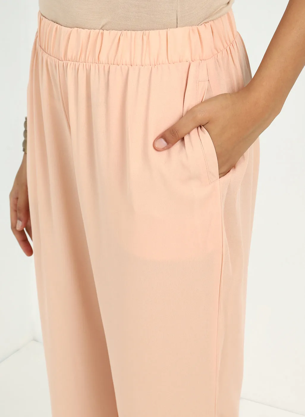 Peach Sequined Kurta Set with Flared Asymmetric Hem